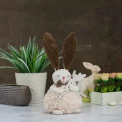 Northlight 14" Beige And Brown Plush Easter Bunny Rabbit Holding A Carrot Spring Figure